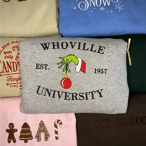 Holiday crewneck sweater in a size L, unisex, Gildan, in the color sport gray.